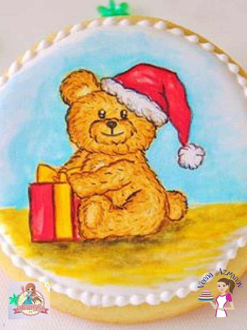 An edible hand painting of a teddy bear.
