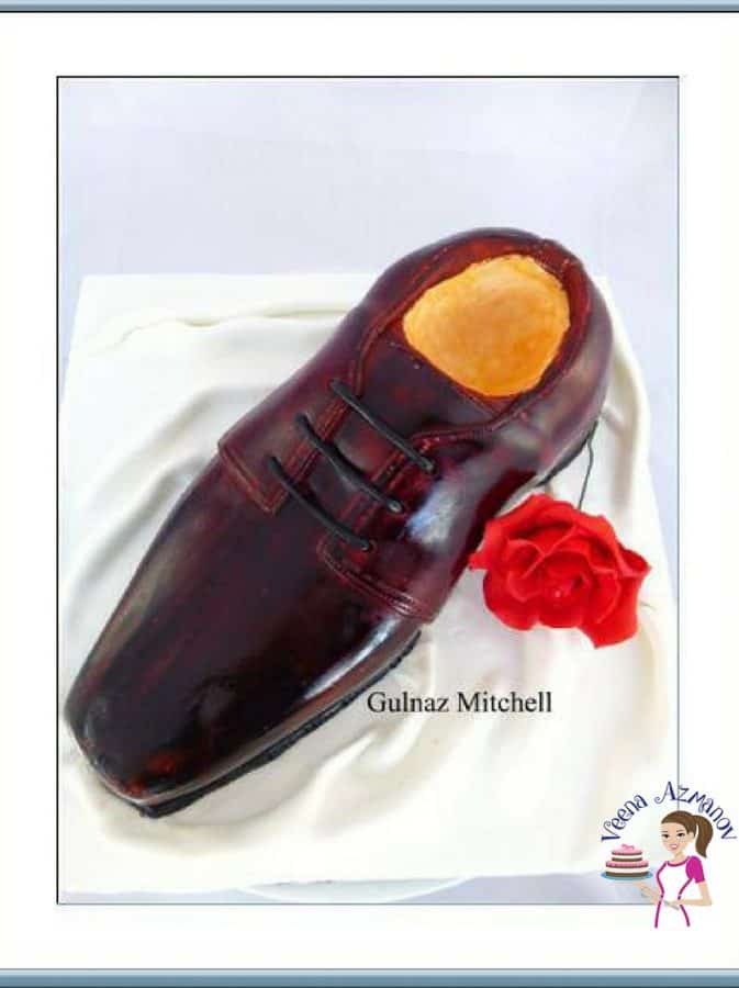 A cake decorated to look like a man\'s shoe.