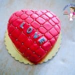 A cake decorated to look like a heart.