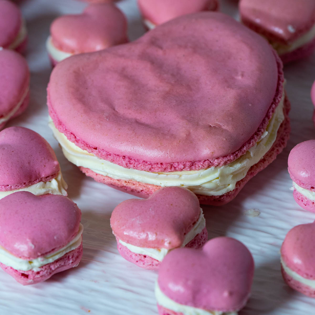 Heart macarons on the table.