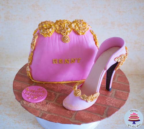 A cake decorated to look like a lady's handbag and stiletto.
