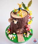 There has got to be some gum paste Easter bunnies on my Easter cake. You can make them sitting or lying down in any form and they look just adorable. I show you how to make the two I know - simple easy and quick in this video and picture tutorial