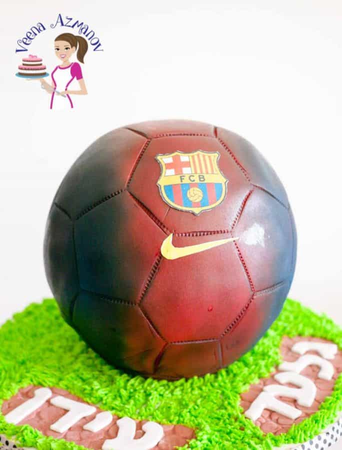 A cake decorated to look like a Barcelona football.