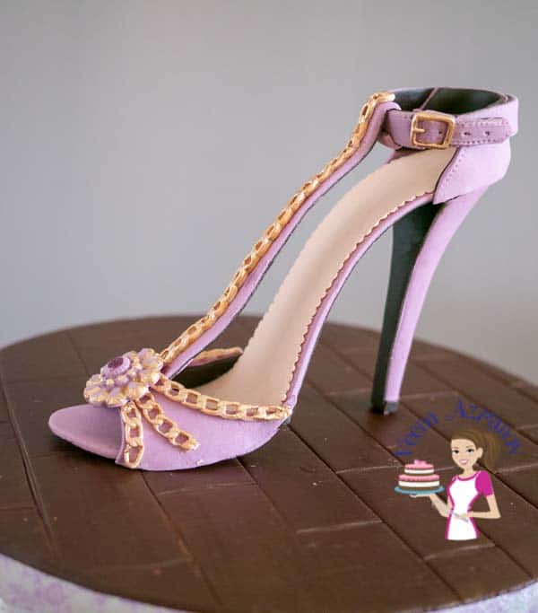 A lady\'s shoe made from gum paste.