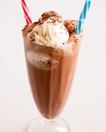 A milkshake glass with frozen hot chocolate