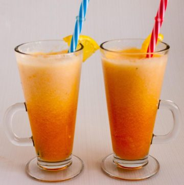 two smoothies with straws
