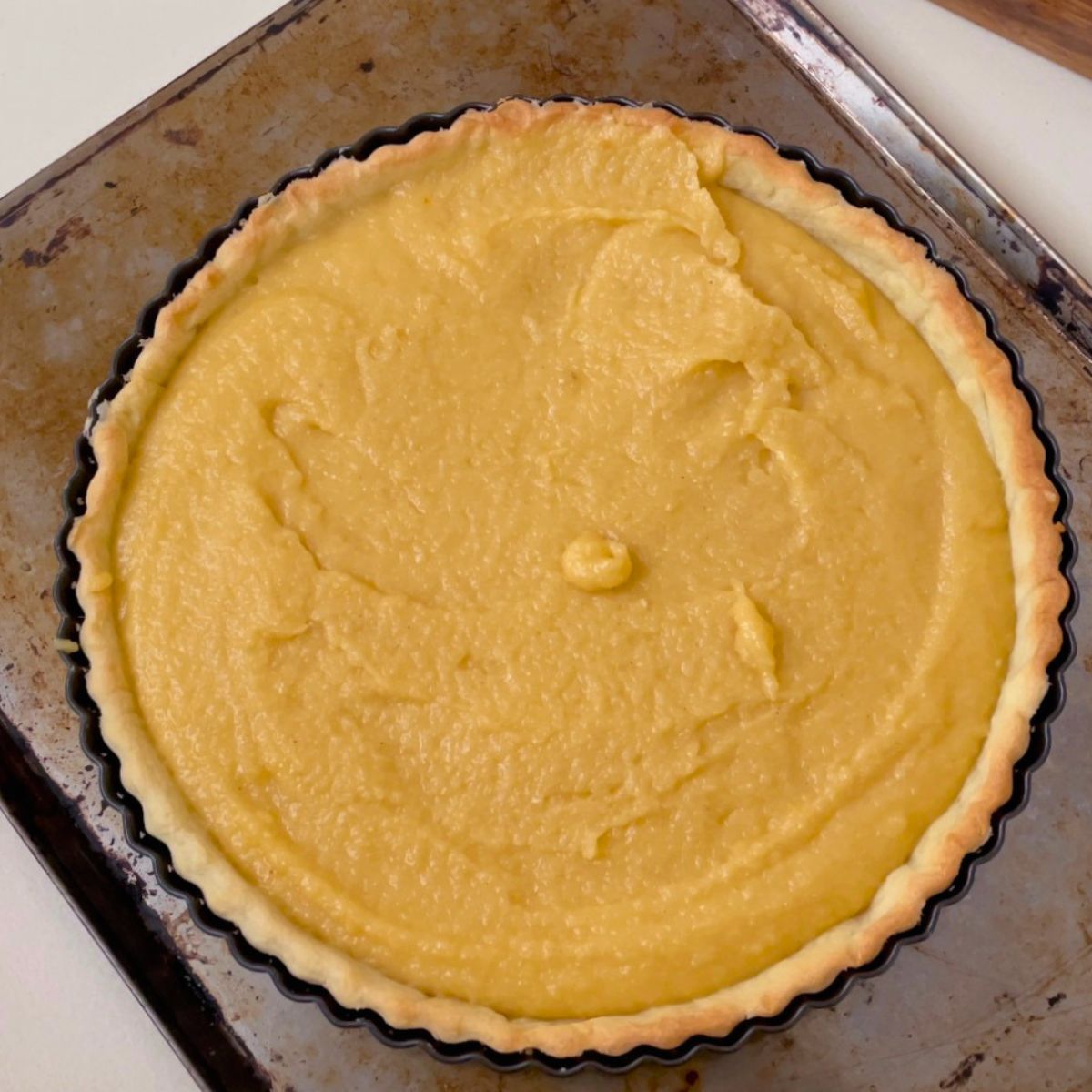 A shortcrust pastry with frangipani filling.