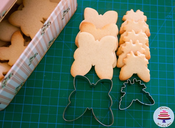 Progress photo of making hand painted butterfly shaped cookies.