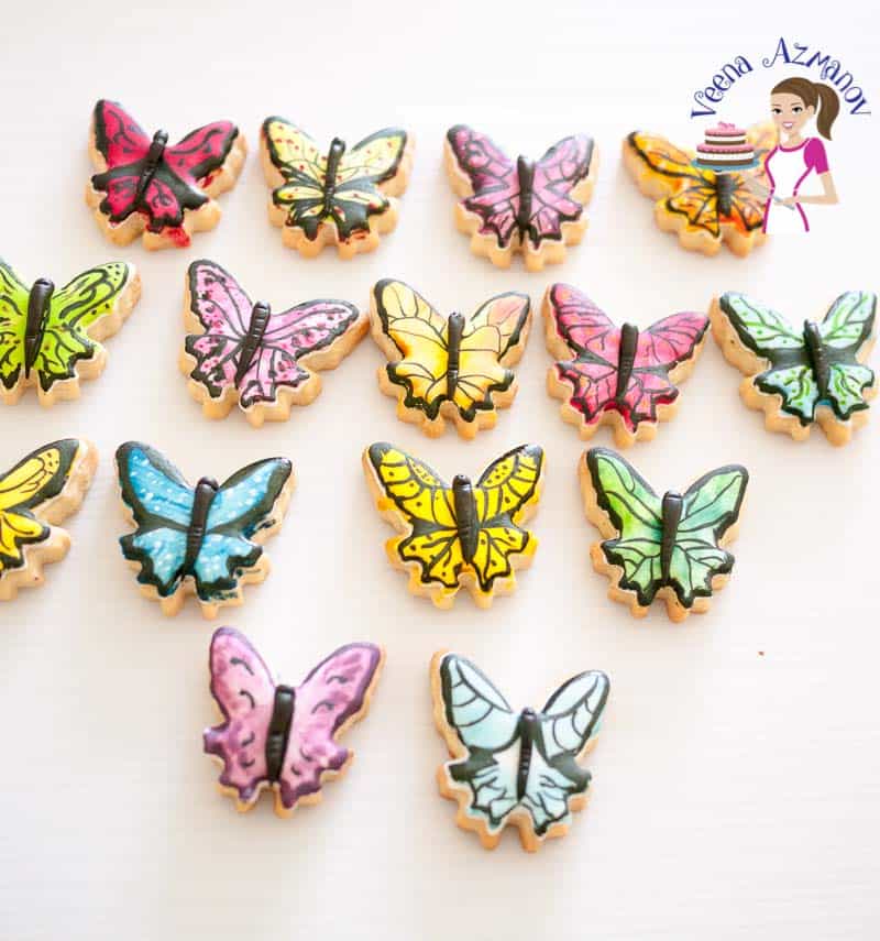 Hand painted butterfly shaped cookies.