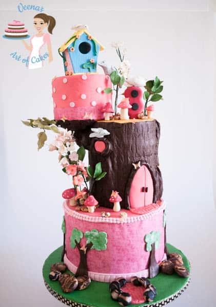 A cake made to look like an enchanted forest birdhouse.