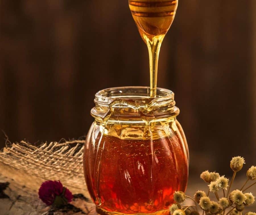 A small jar of honey.