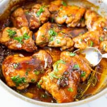 Balsamic cooked chicken in a saute pan.