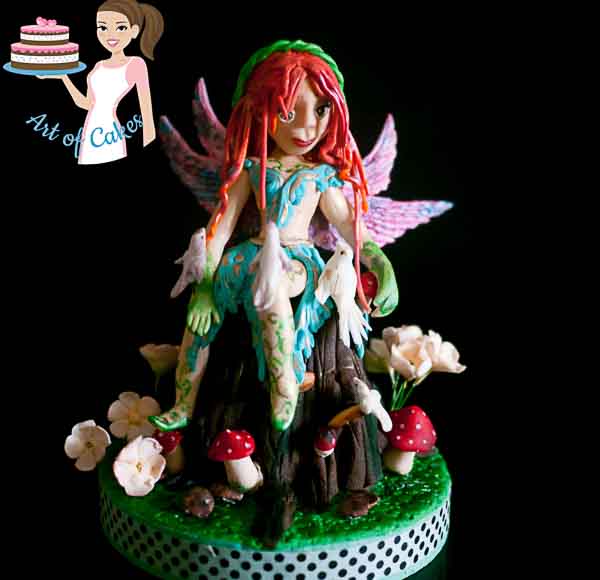 A cake decorated to look like a woodland fairy.