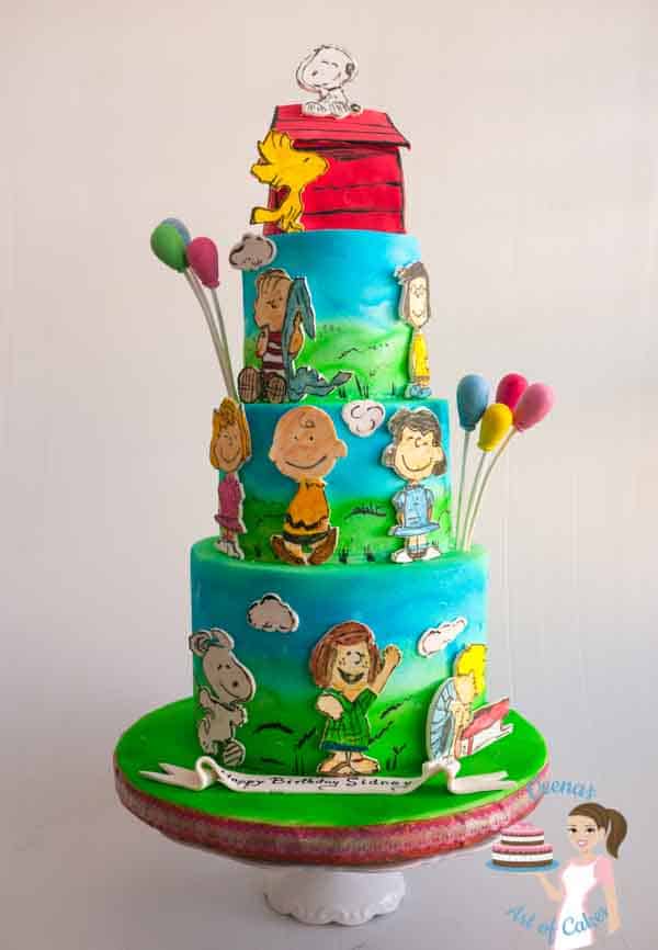 A cake decorated with the Peanuts comic theme.