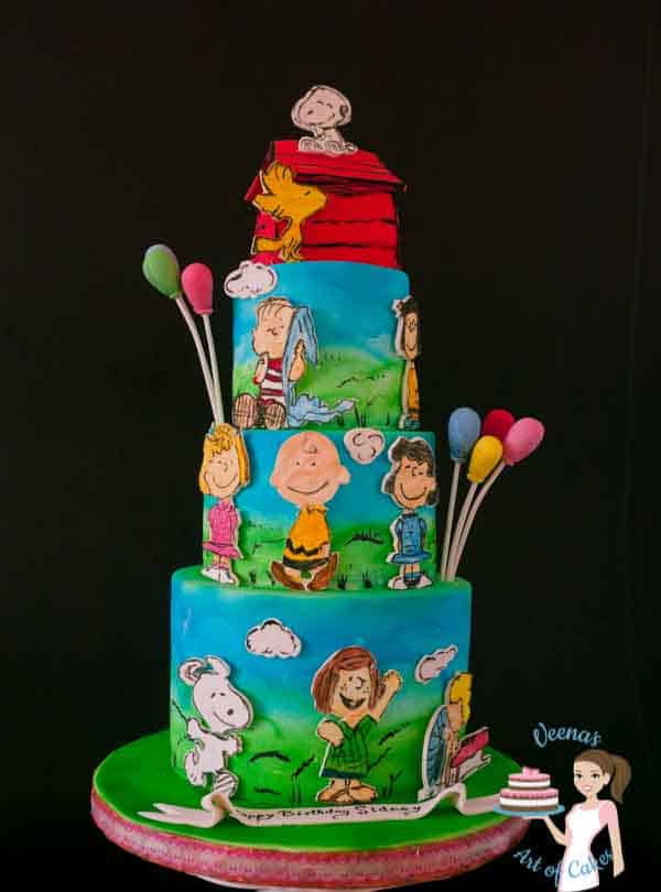 A cake decorated with the Peanuts comics theme.