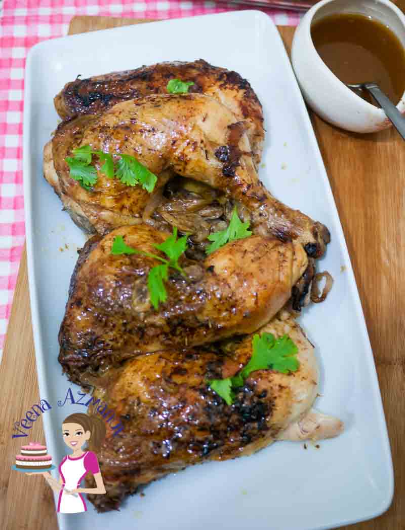 Baked chicken thighs in a serving dish.