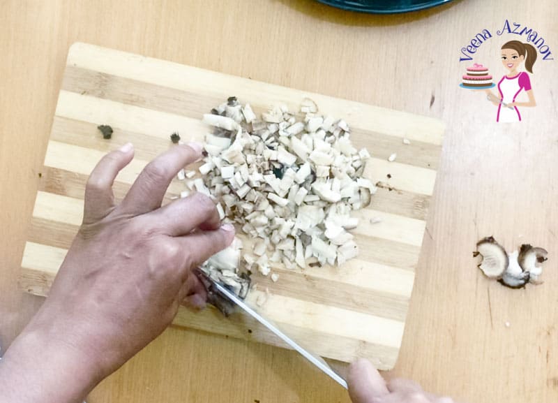 chop the mushroom stalks for stuffing progress pictures