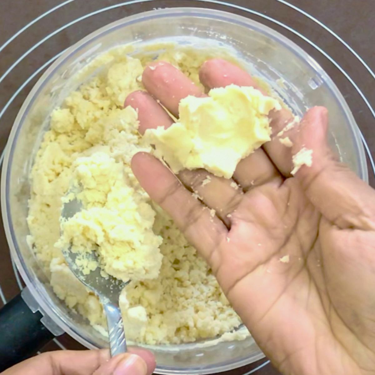 A food processor with pie dough.