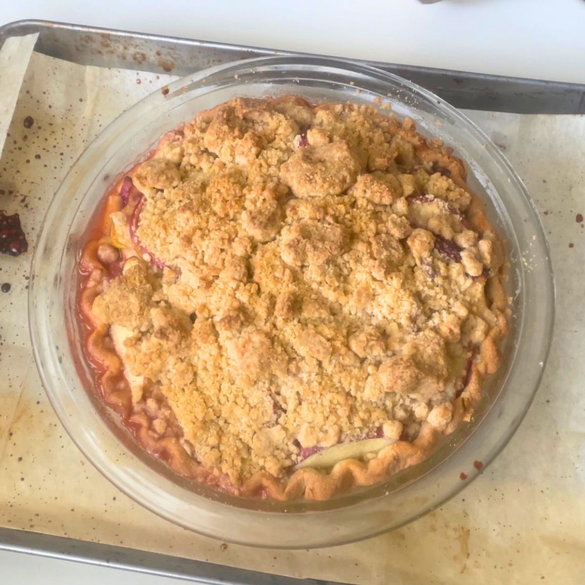 A baking tray with fresh baked pie.
