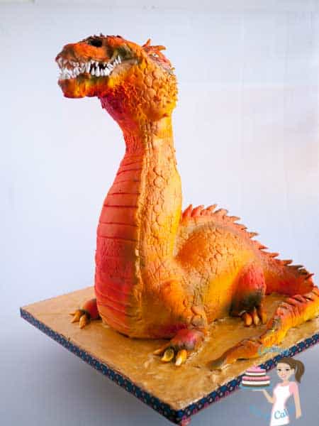 A cake decorated to look like a dragon.