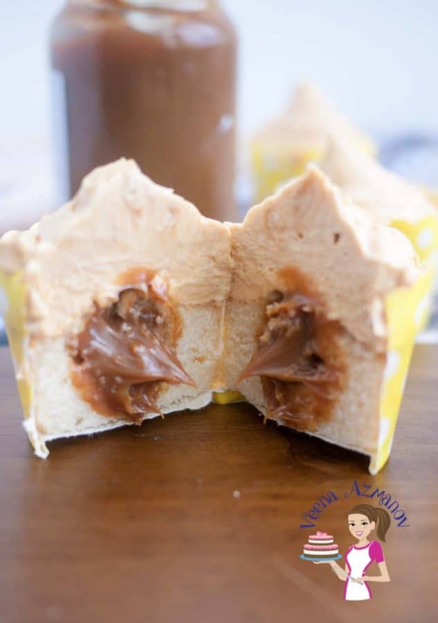 Dulce de leche cupcake sliced in half.