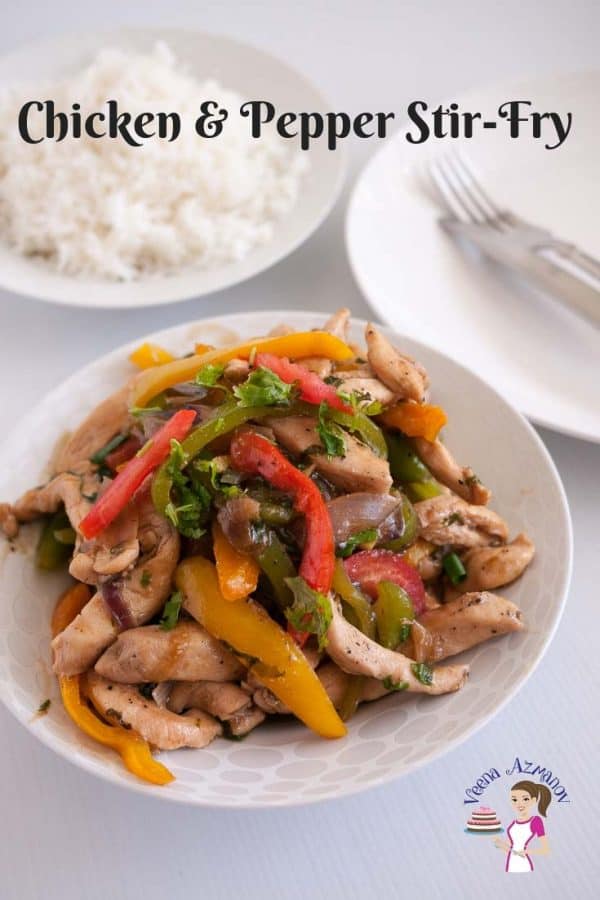 Chicken and peppers stir fry in a plate.