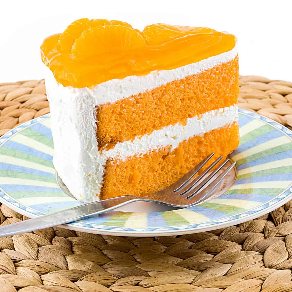 Orange cake on a plate.
