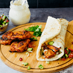 A shawarma wrap with homemade flatbread.