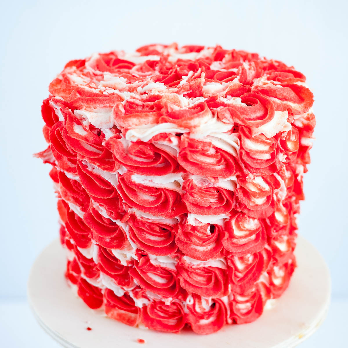A frosted cake on the table.