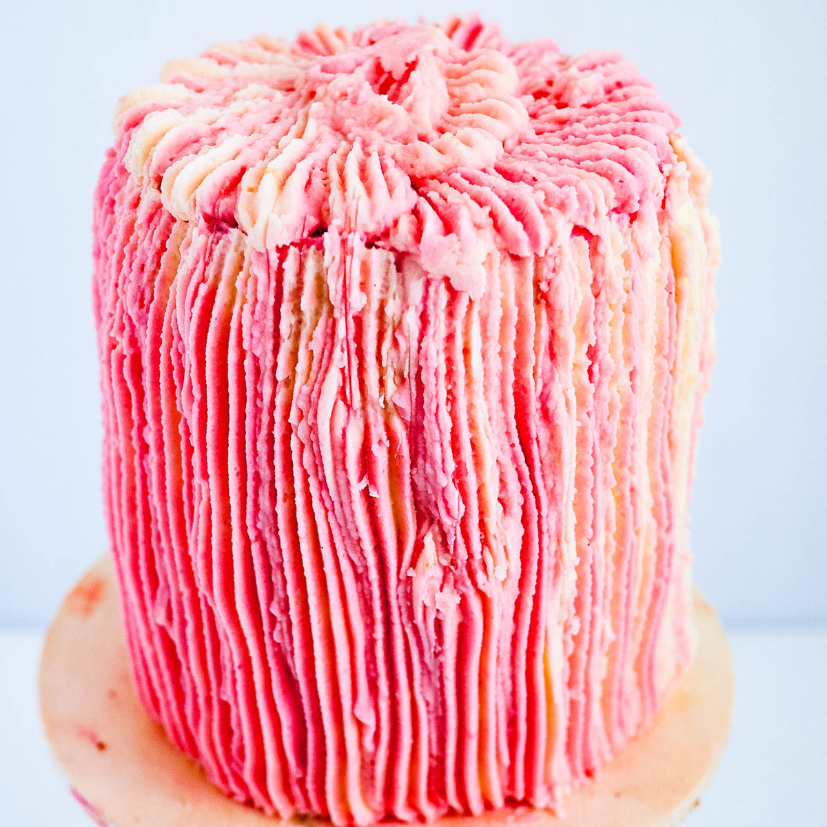 A frosted cake on the table.