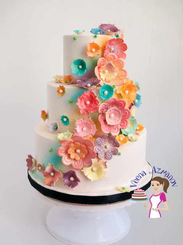 This is my recent creation - Blossoms White Wedding Cake made for a lovely bride that wanted to have a cake full of flowers. This is my recent creation - Blossoms White Wedding Cake made for a lovely bride that wanted to have a cake full of flowers.