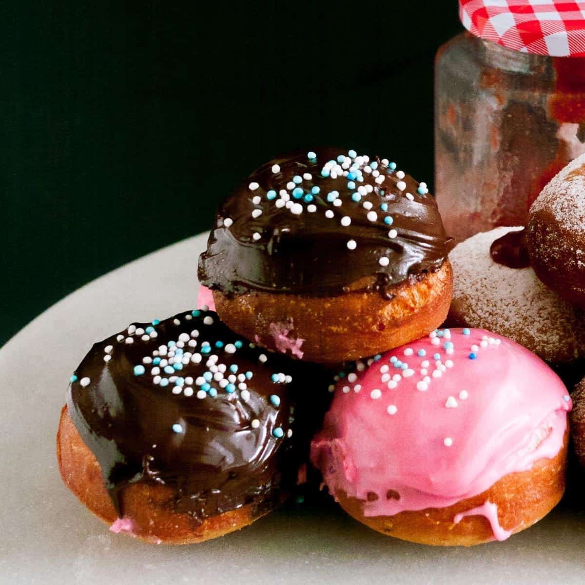 Chocolate donuts on a cake stand