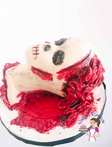 This Halloween Brain Spill Head cake was made for a 16th Birthday celebration. The cake Moist Chocolate cake with Vanilla frosting and fondant accents. This Halloween Brain Spill Head cake was made for a 16th Birthday celebration. The cake Moist Chocolate cake with Vanilla frosting and fondant accents.
