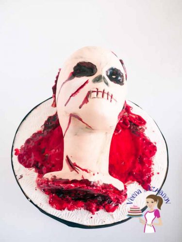 This Halloween Brain Spill Head cake was made for a 16th Birthday celebration. The cake Moist Chocolate cake with Vanilla frosting and fondant accents. This Halloween Brain Spill Head cake was made for a 16th Birthday celebration. The cake Moist Chocolate cake with Vanilla frosting and fondant accents.