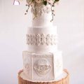 A decorated white wedding cake.