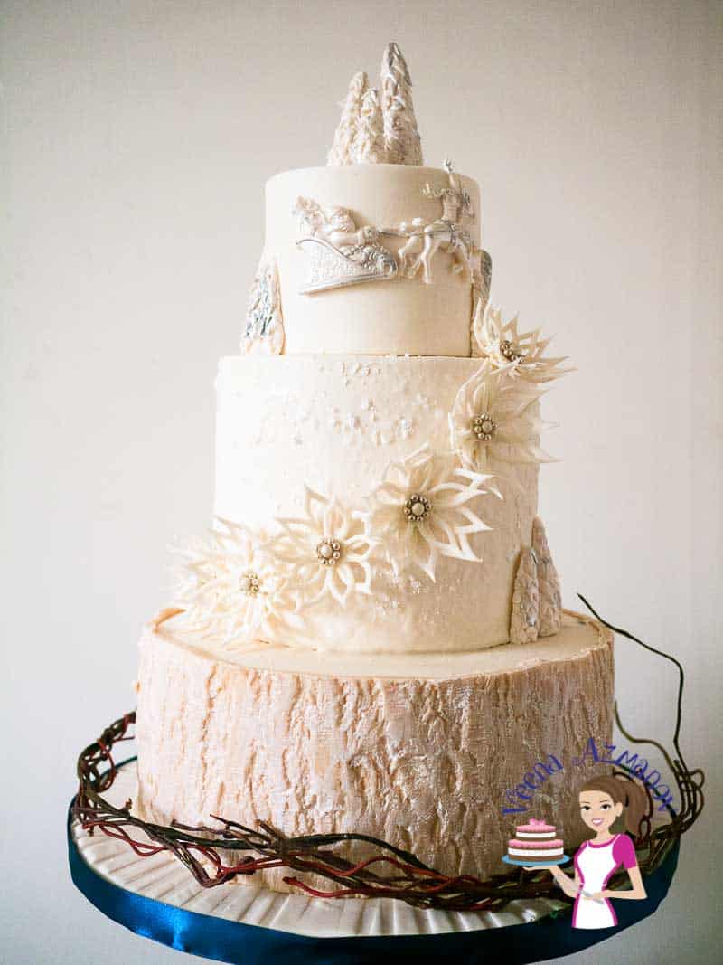 A wedding cake with sugar flowers.