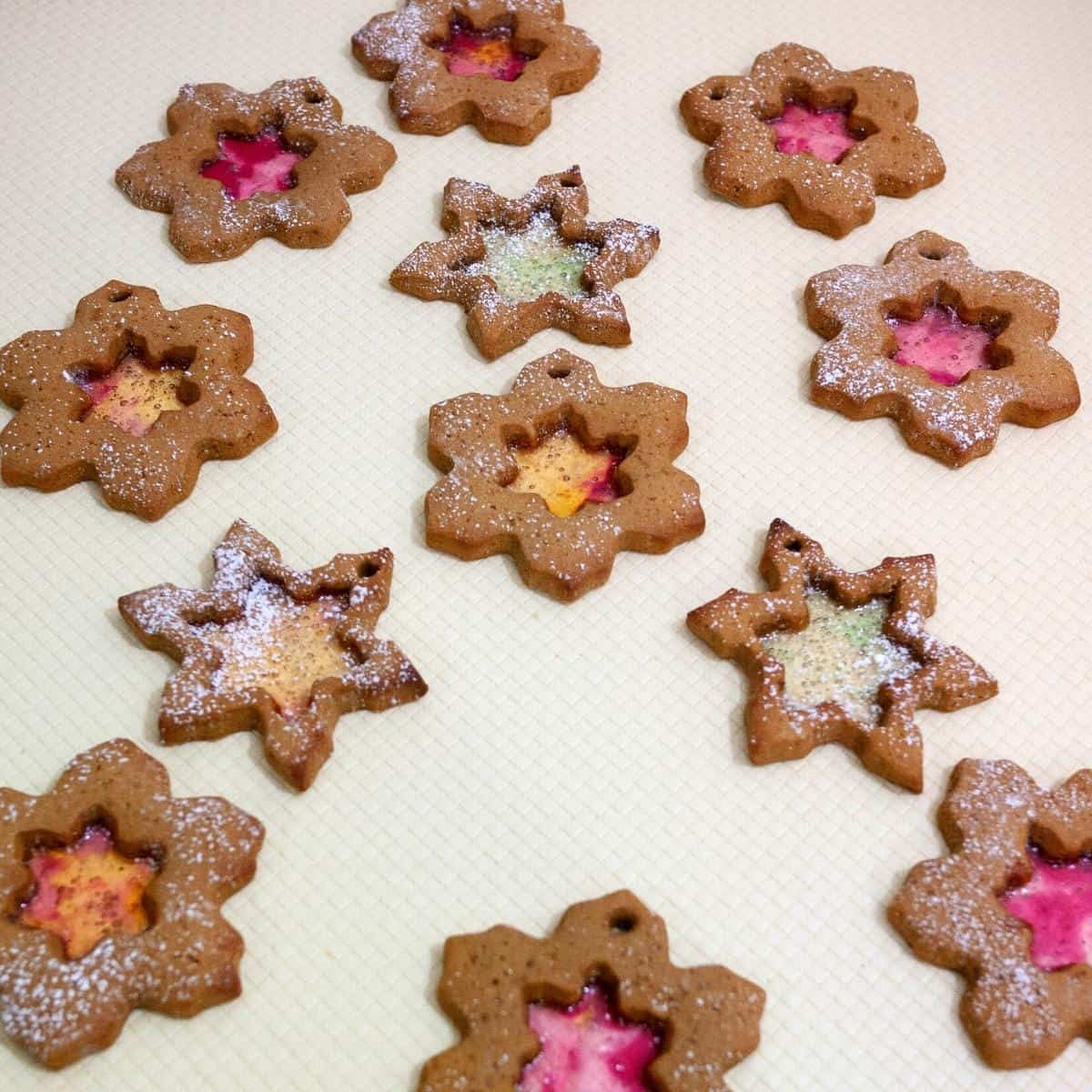 Gingerbread cookies with stained glass cookies.