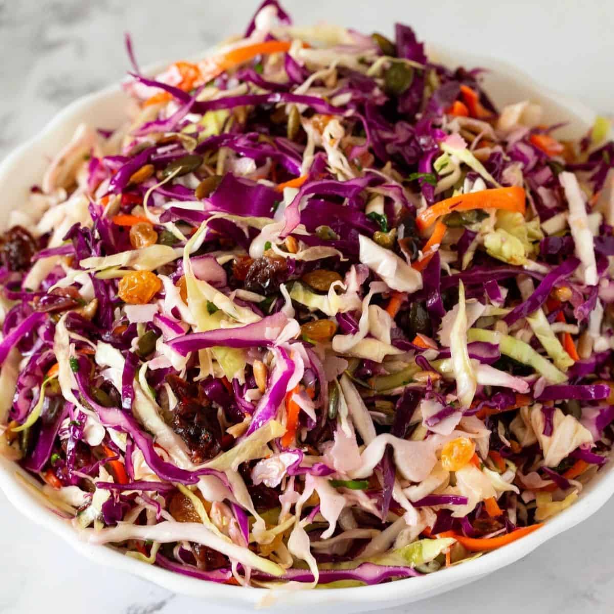 A bowl with shredded cabbage salad.