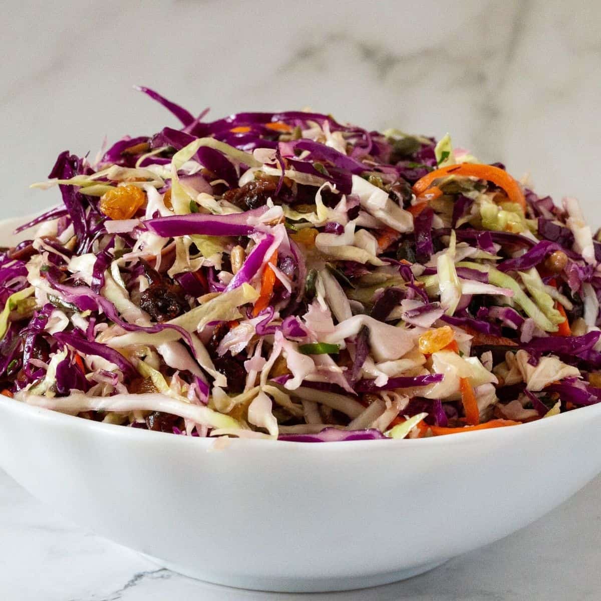A bowl with cabbage salad recipe.