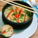 A bowl of Thai noodle soup with prawns.