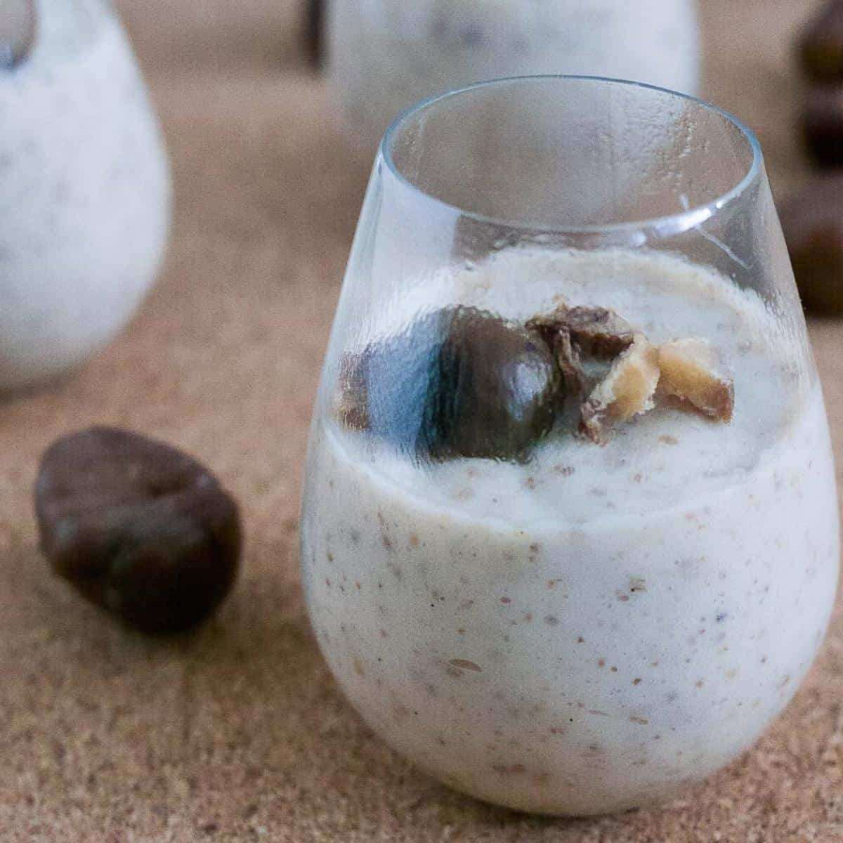 A glass with mousse and sliced chestnuts
