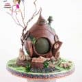 A cake decorated like a hobbit house.