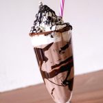 A milkshake with straw