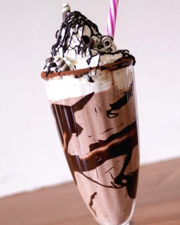 A milkshake with straw