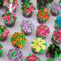 Cupcakes decorated with buttercream flowers.