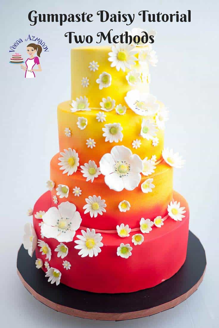 A cake decorated with gum paste flowers.