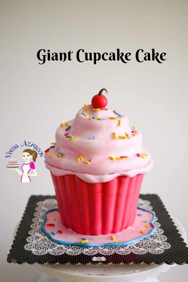 A cake decorated to look like a giant cupcake.
