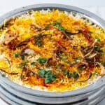 An Indian pot with Hyderabad Dum biryani.
