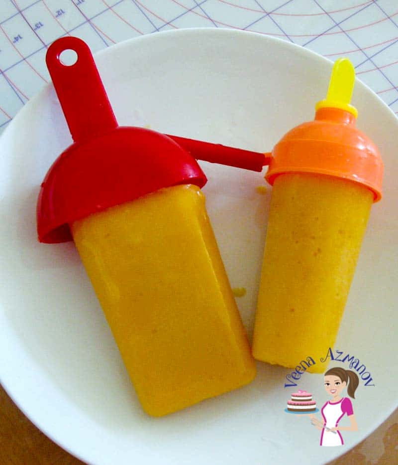 Two mango ice cream pops.