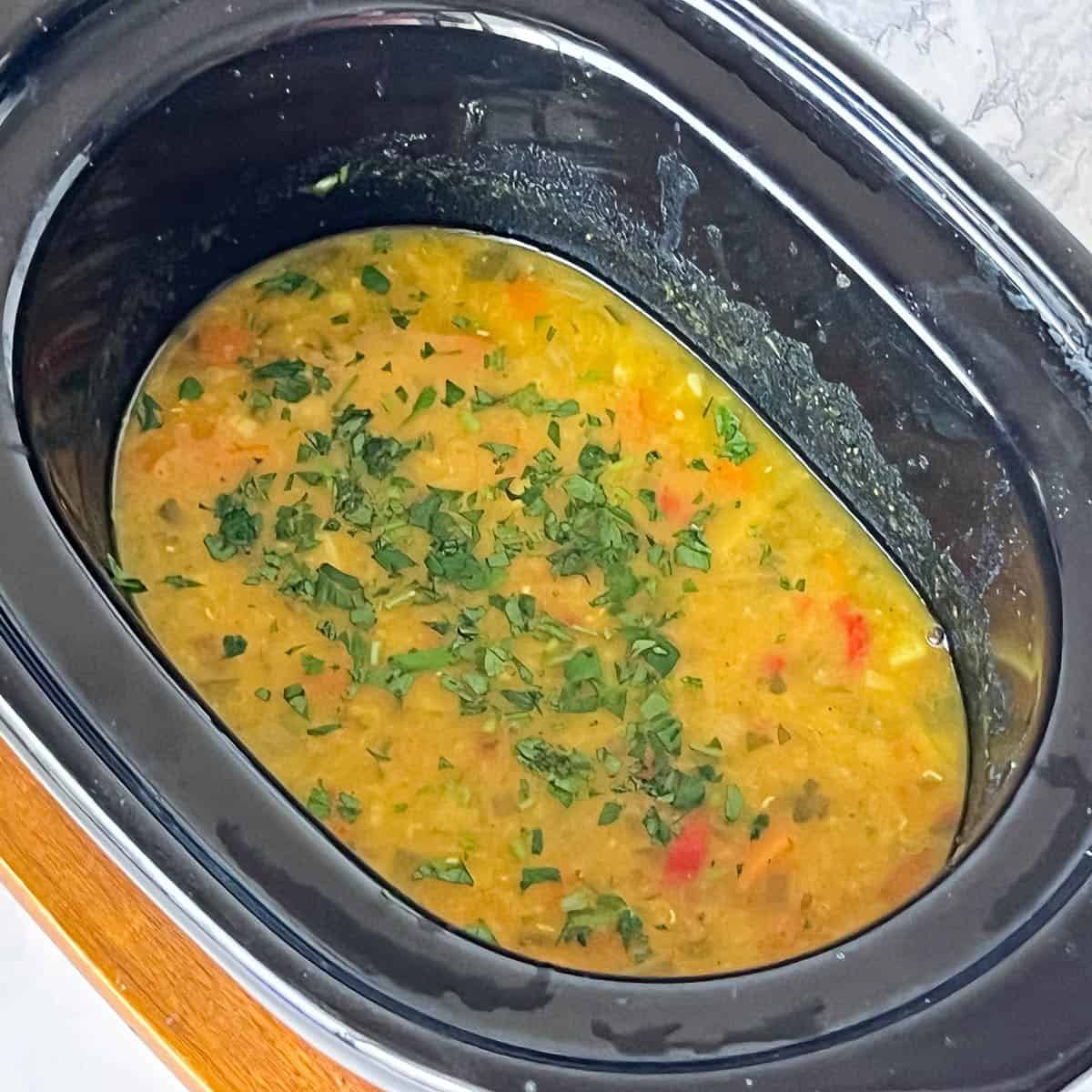 Lentil soup in a slow cooker.